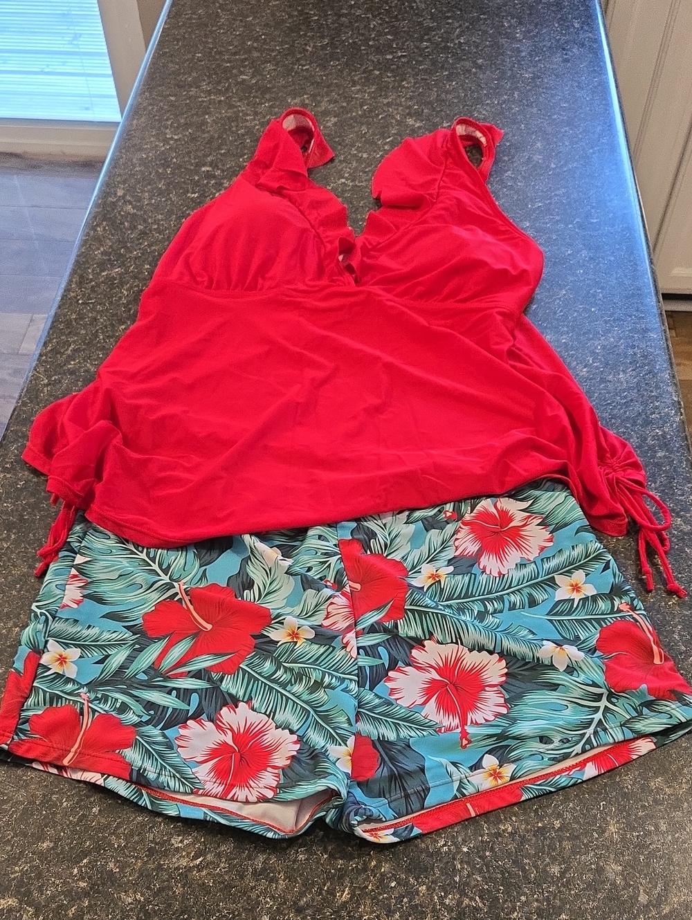 Vibrant Red Tankini with Tropical Floral Swim Shorts